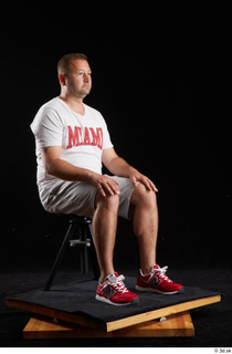  Louis  2 dressed grey shorts red sneakers sitting sports white t shirt whole body 0006.jpg